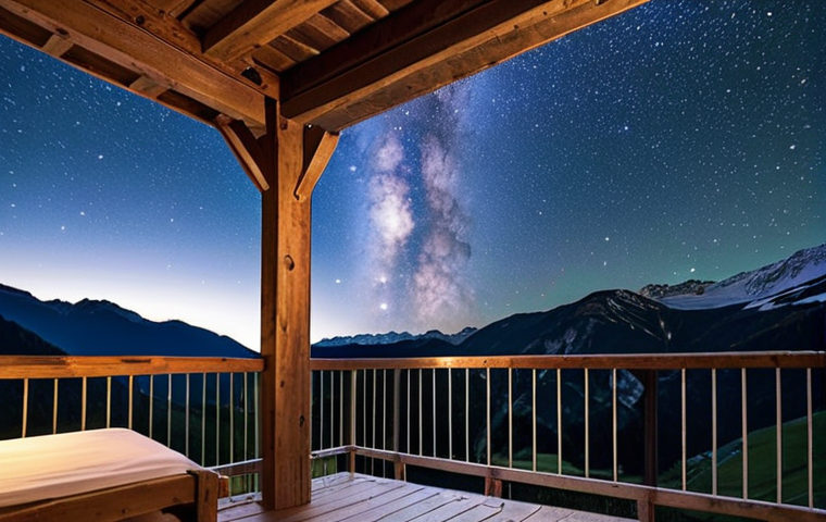 **Prompt 1: Alpine Starry Night Panorama**
An awe-inspiring, crystal-clear night sky seen from a cozy, rustic guesthouse balcony in the Austrian or South Tyrolean Alps. The foreground features a comfortable, blanket-draped seating area on the balcony. In the midground, distant valley lights form a 'carpet of warm light', twinkling like scattered jewels. Above, the vast expanse of the sky is dominated by a vibrant Milky Way and countless stars, conveying a sense of serene vastness and peaceful solitude. The architectural style of the guesthouse hints at traditional Alpine design.